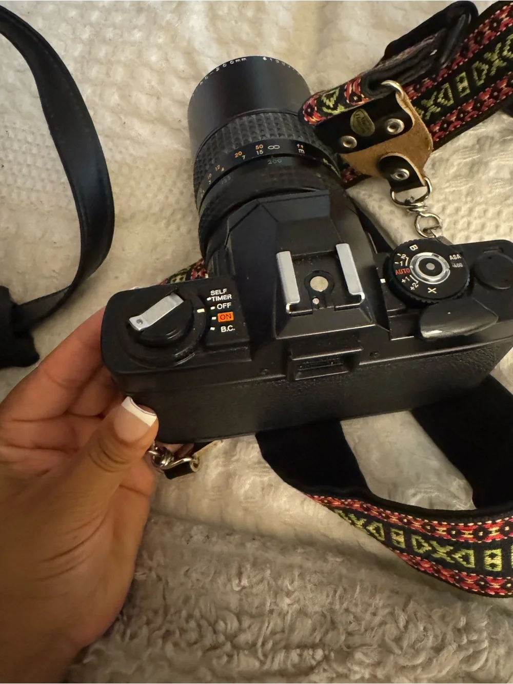 X-7 Minolta Black SLR Camera with Telephoto Lens